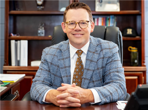 Dale Cole at desk